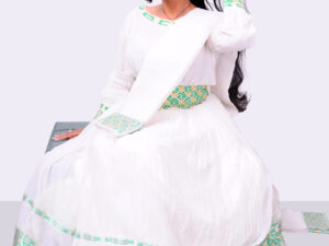 Elegant Habesha Dress with Rich Green Embroidery and Contemporary Charm