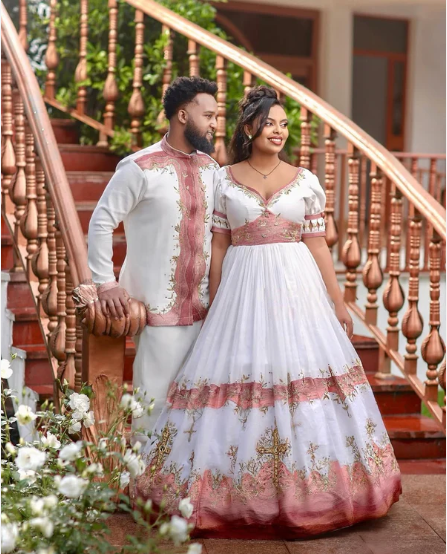 Glamorous Light Pink Habesha Wedding Outfit with Matching Couple Design