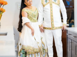 Couple's Distinctive Wedding: Golden Radiance Habesha Bridal Wear with Green Stitching