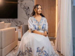 Graceful Habesha Kemis with Pastel Blue and Gold Embroidery for Engagements and Celebrations