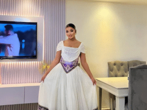 Timeless Habesha Kemis with Vibrant Purple Accents for Lasting Style