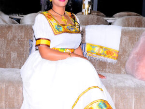 Elegant Traditional Ethiopian Dress with Vibrant Yellow Embroidery for Special Occasions