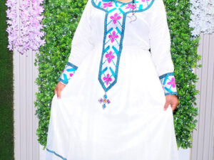 Radiant Habesha Dress with Elegant Green Embroidery a Beautiful Choice for an event